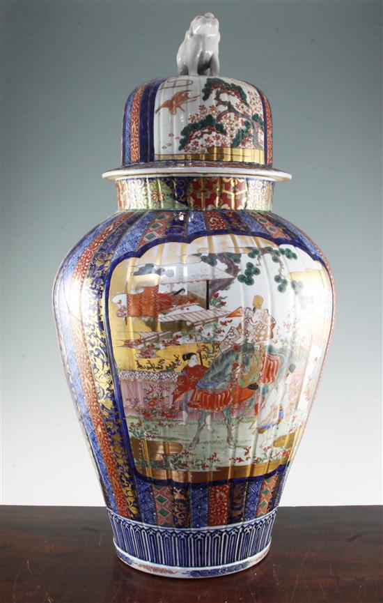 A large Japanese Imari fluted vase and cover, late 19th century, 79cm, broken and repaired